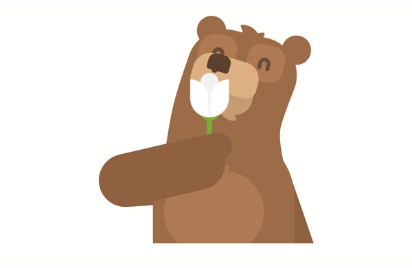 That bear loves the smell of the flowers here.